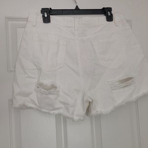 white shorts.